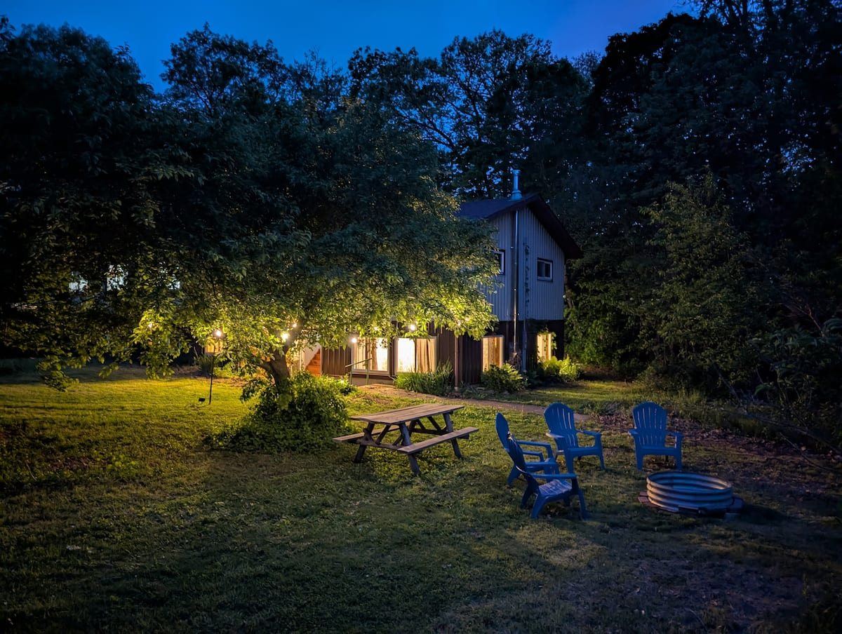 Farmstay 2 exterior and lawn at night