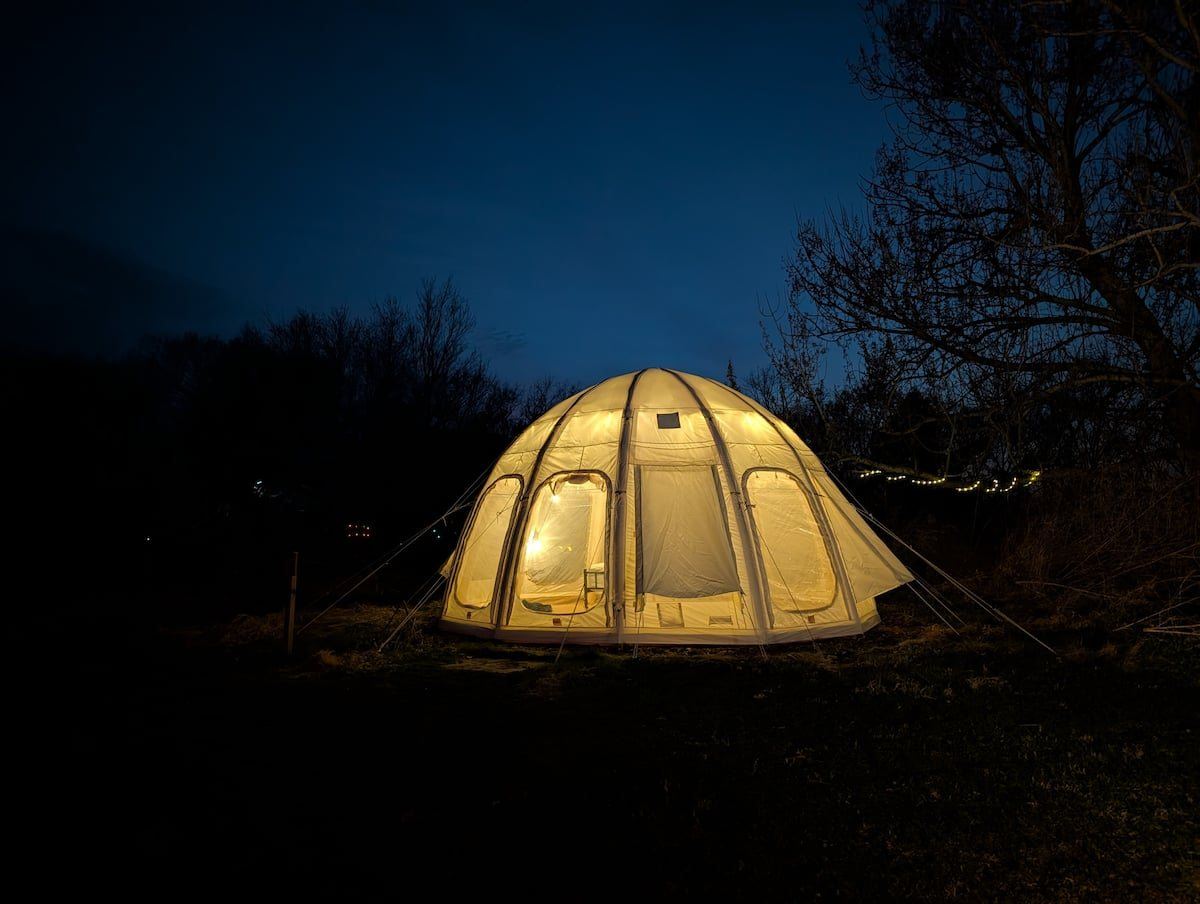 Raspberry dome tent glowing at night